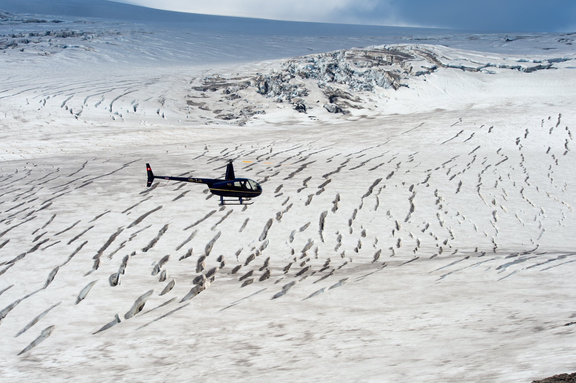 Our Robinson R66 over glacier